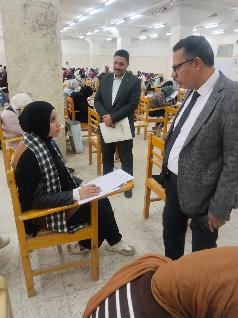 The dean of the college inspects the examination committees and praises their discipline.